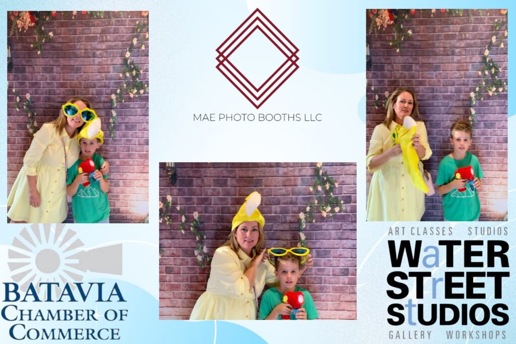 Mae Photo Booths LLC rental for a Batavia Chamber of Commerce event at Water Street Studios in Batavia, Illinois. The image shows three photo booth captures of a woman and child posing with fun props against a rustic brick and floral backdrop.