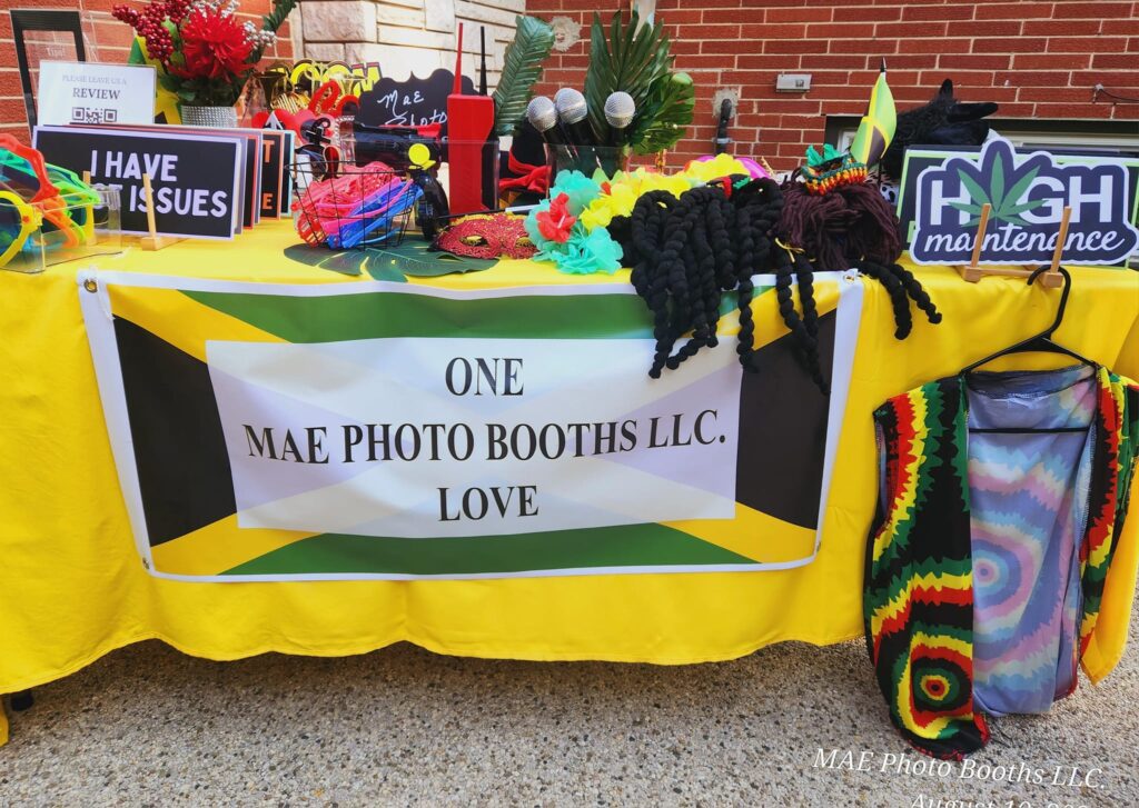 in this image mae photo booth LLC accessories for the wedding event